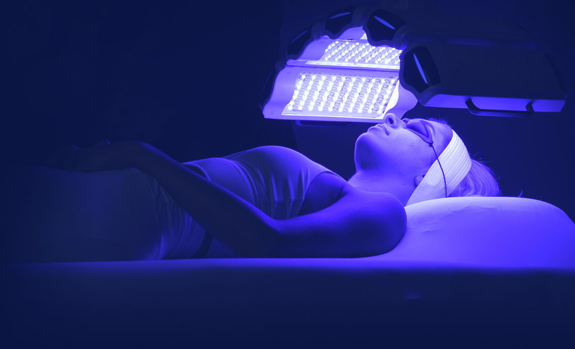 Woman with neutral-toned outfit and accessories.