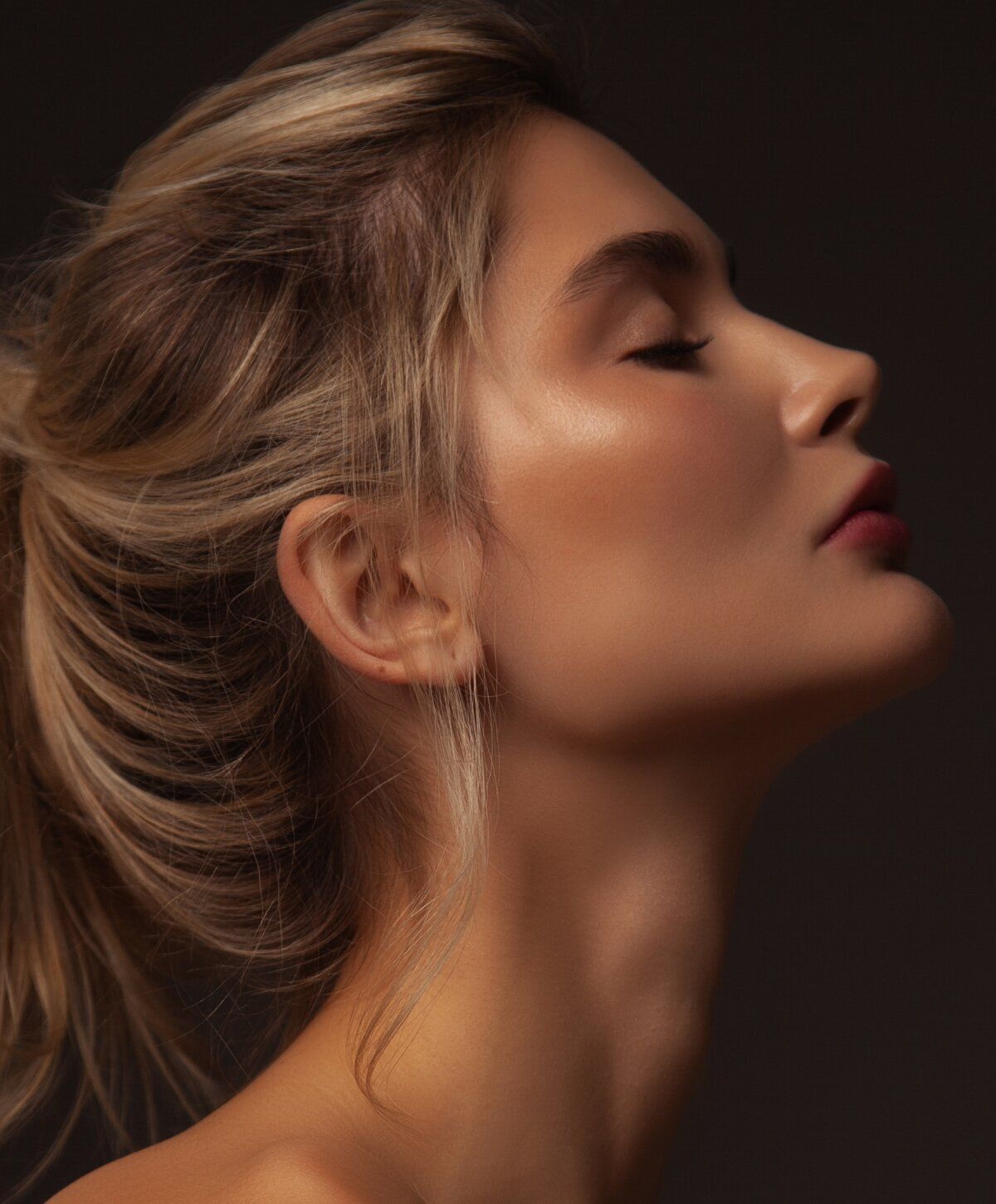 Profile of a woman with elegant features.
