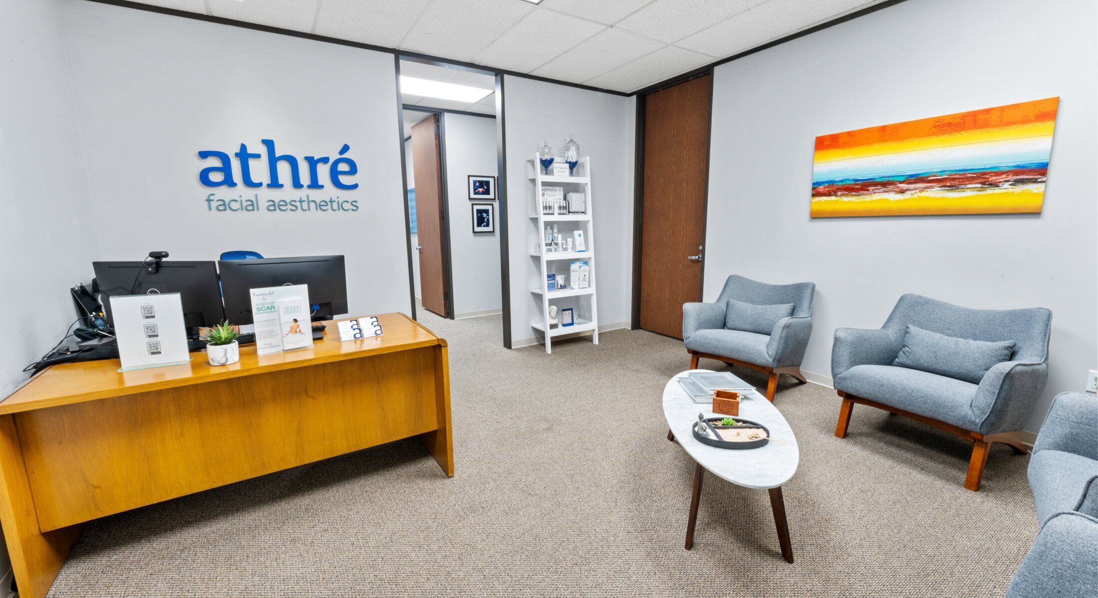 Modern aesthetic office interior with seating area.